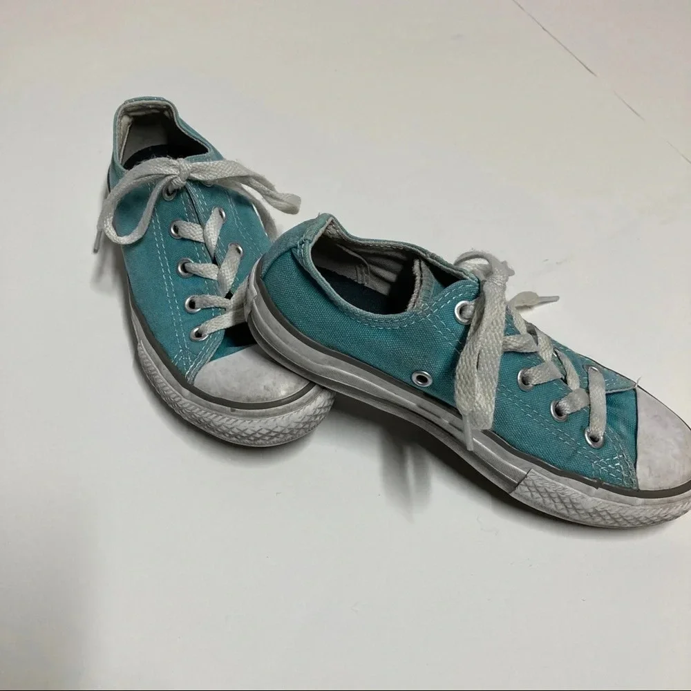 Kids size 13 teal Converse. In play condition